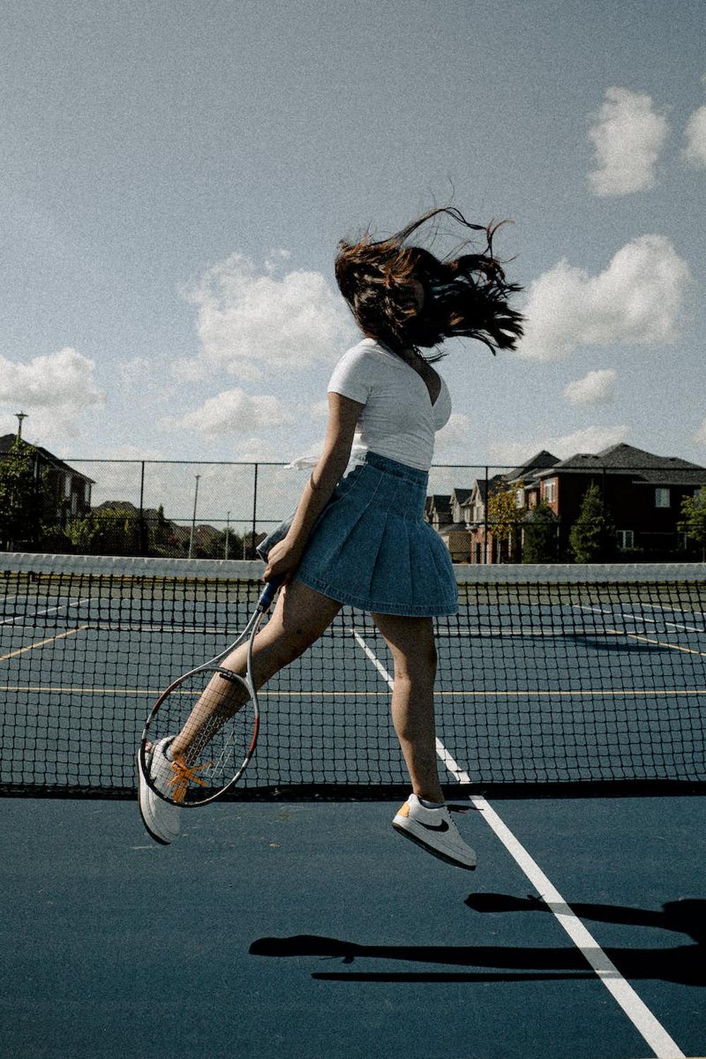 women_s_white_v_neck_shirt_and_blue_miniskirt